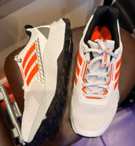front and side view of adidas trail shoes